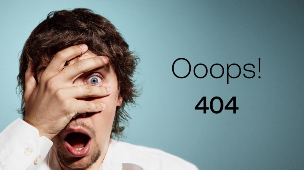 En mann holder hånden foran det ene øyet og har munnen åpen. Tekst: Ooops! 404